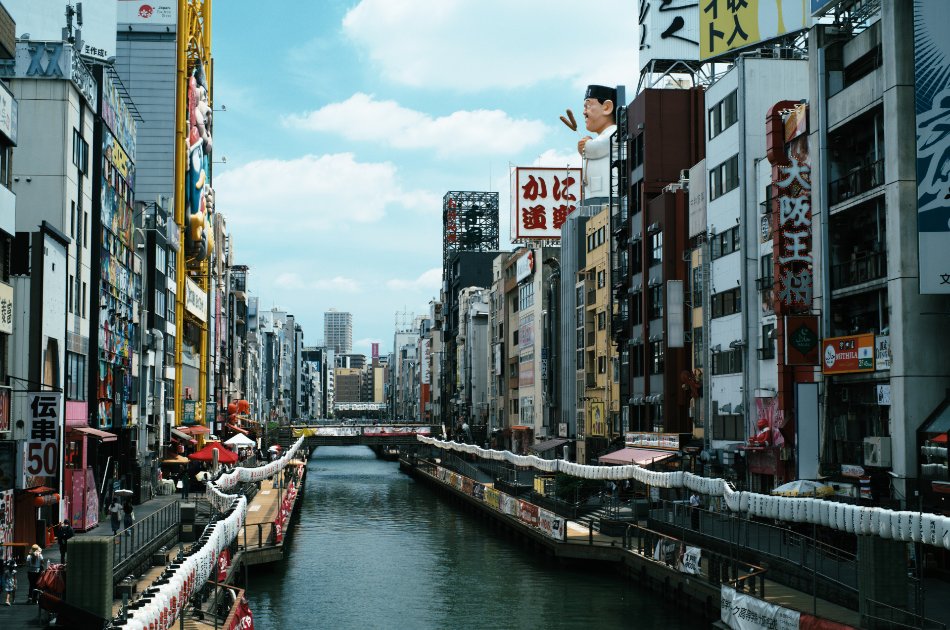 The Dotonbori canal in Osaka lined with signs