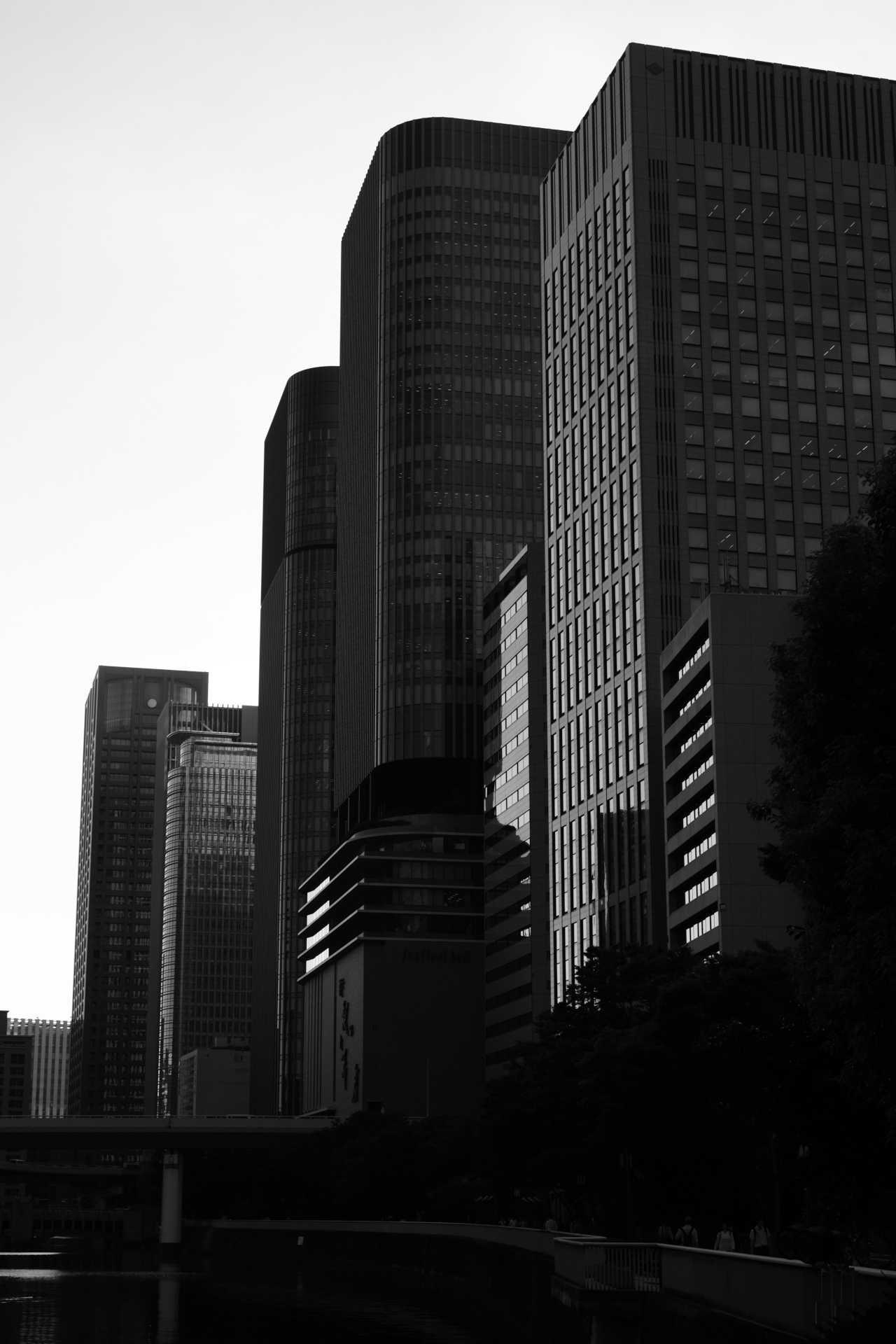 Looking up between dark skyscrapers