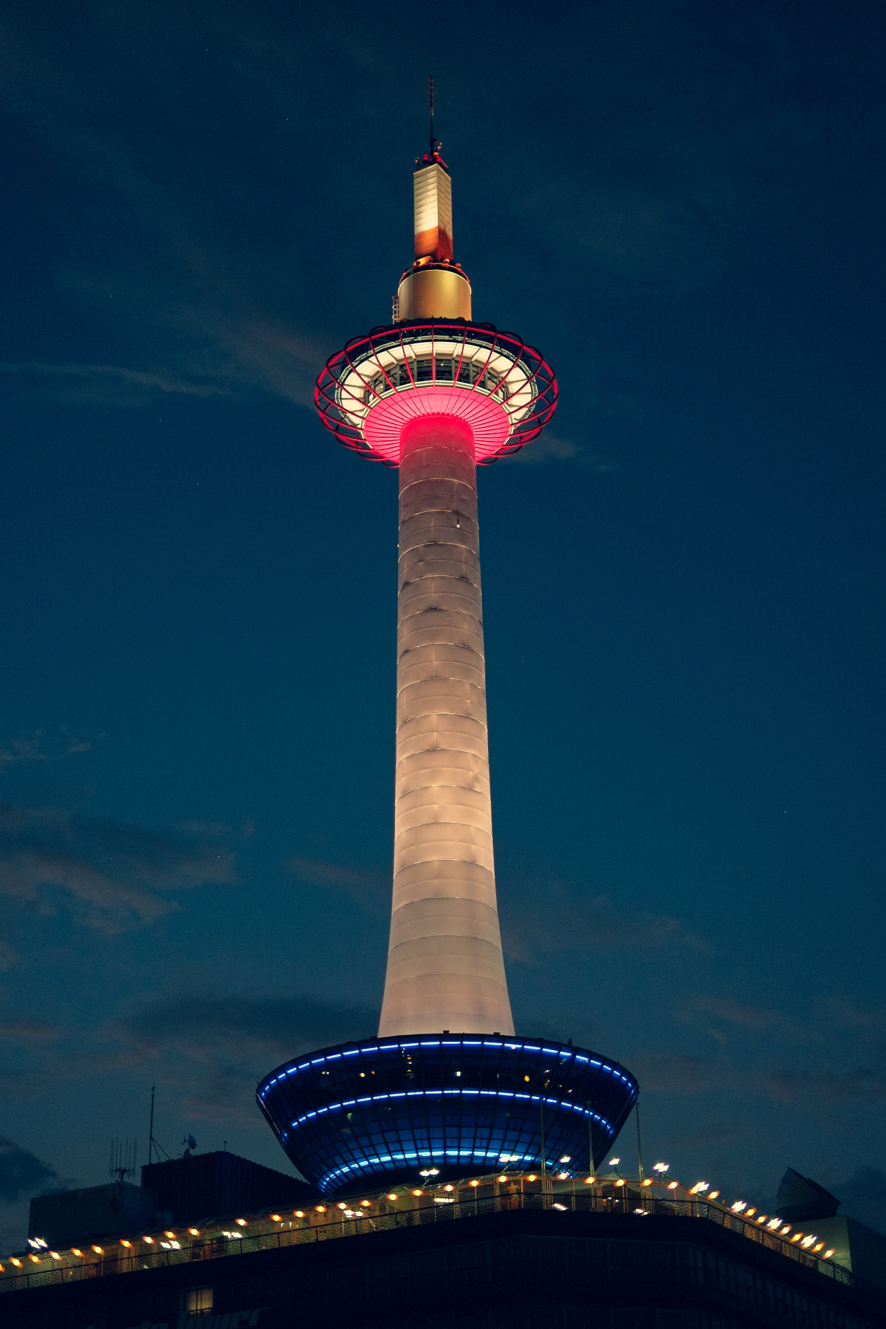 Tsutenkaku Tower glowing red at night